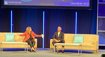 Carnival Cruise Line senior vice president of global sales and trade marketing, at CruiseWorld with Northstar Travel Group's Mary Pat Sullivan.