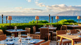 Lower terrace seating at Ferraro’s Restaurant & Bar gives patrons unobstructed views of the ocean.
