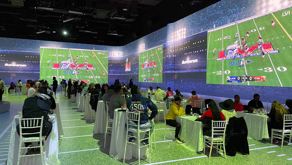 Illuminarium Las Vegas is hosting a Super Bowl viewing party for fans of all ages.