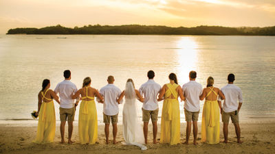 A wedding party at sunset at the Shangri-La Yanuca Island in Fiji.